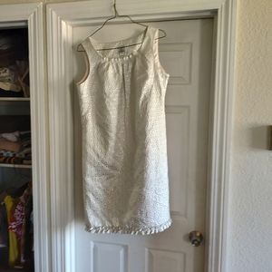Mid length white with silver thread detailing size 14. Brand is Sarah Campbell.